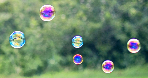 Strange colors of blowing soap bubbles