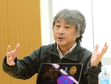 Professor Murayama describes an image of the “Big Bang,” as seen on his computer screen.